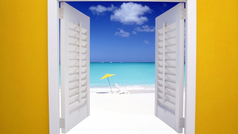 Beach View Through Shutters