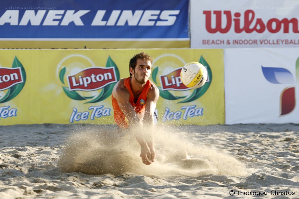 beach volleyball player diving