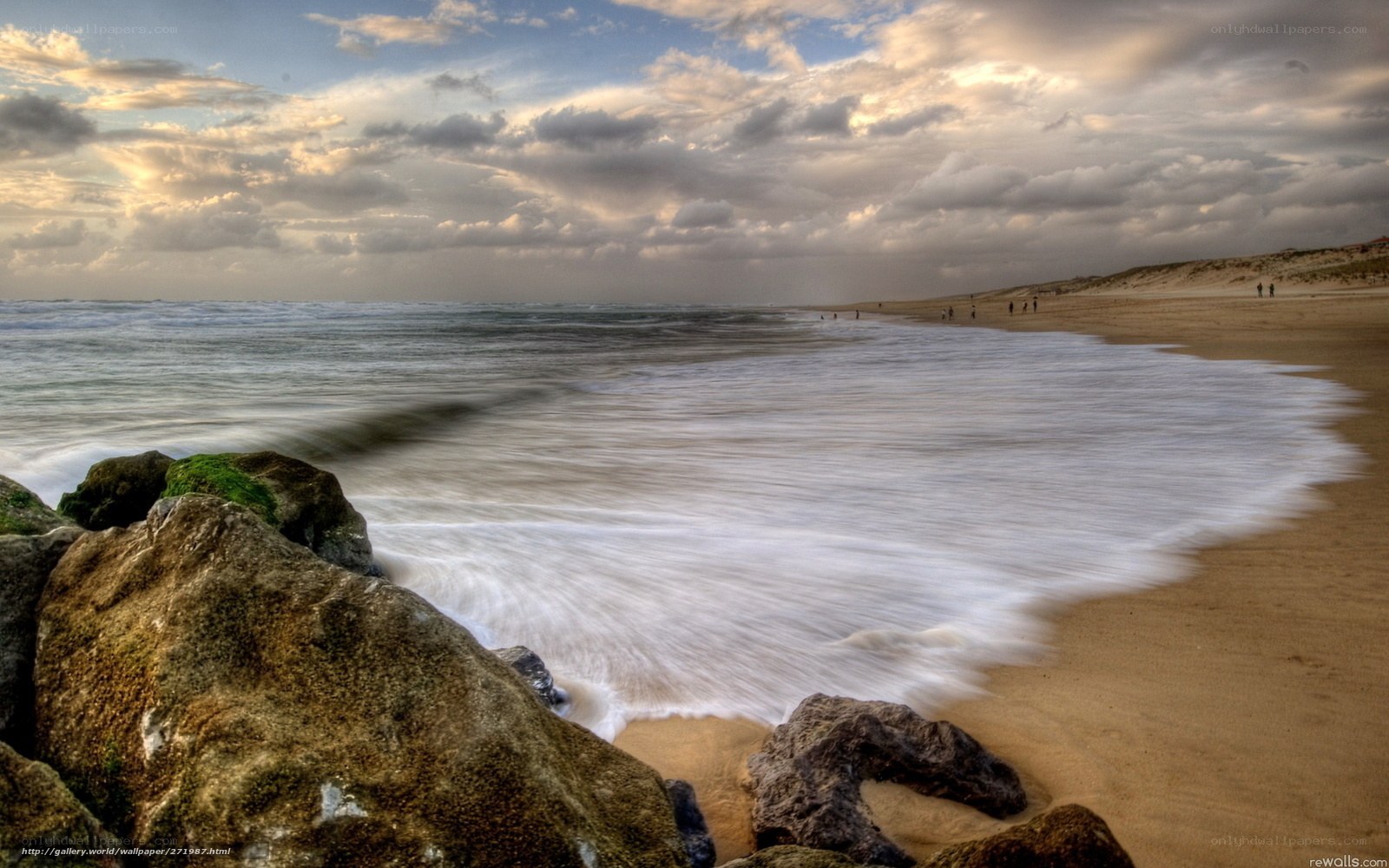 Beach waves at sunset