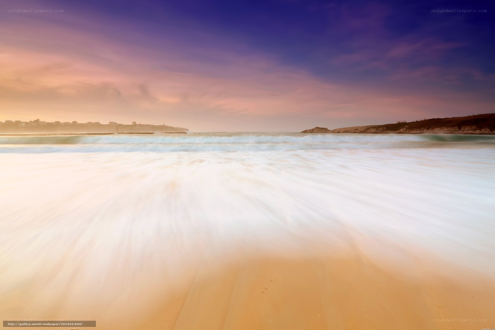 Beach waves at sunset