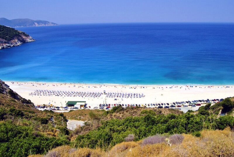beach with blue sea and white sand