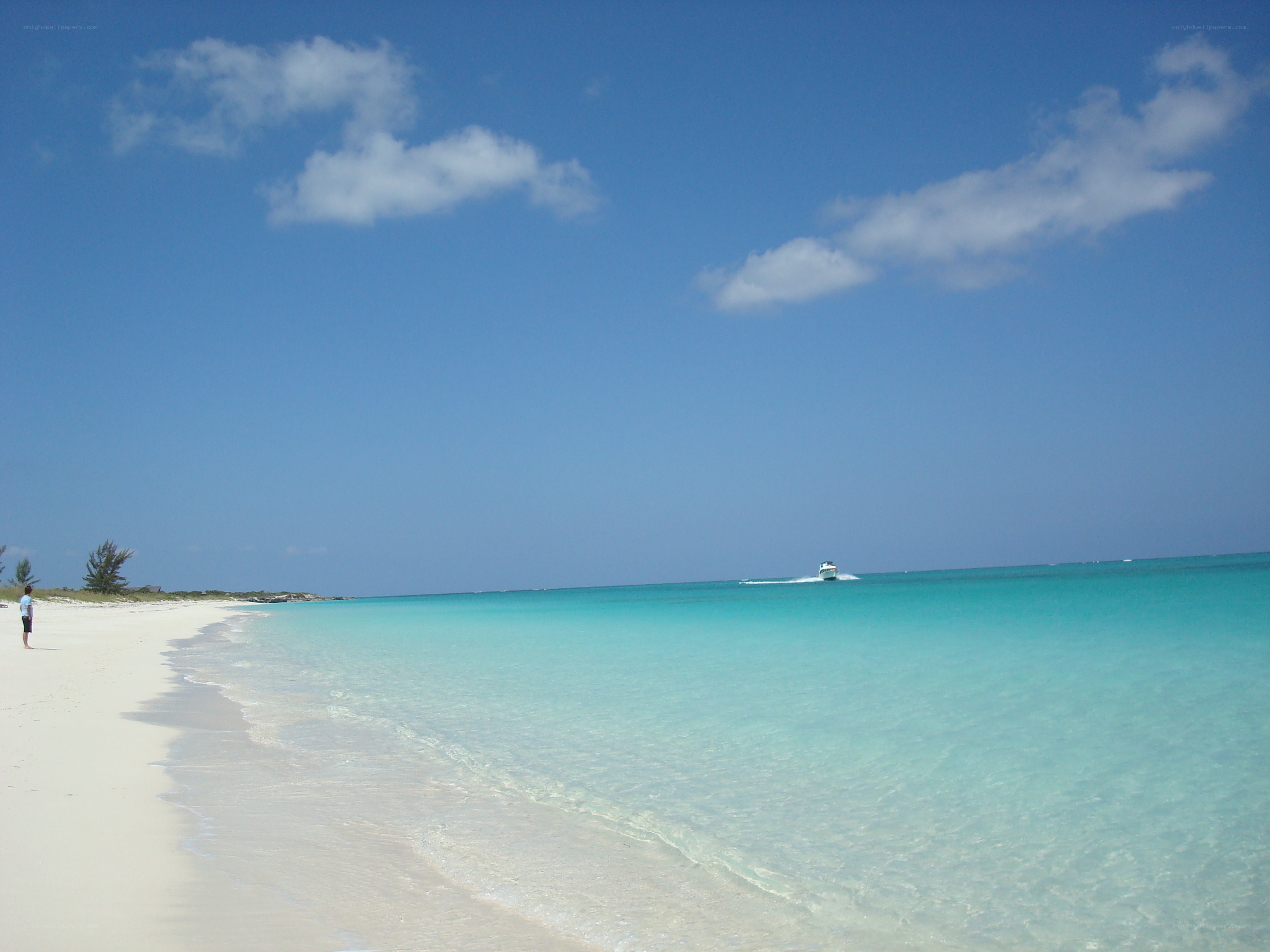 Beach with boat in distance