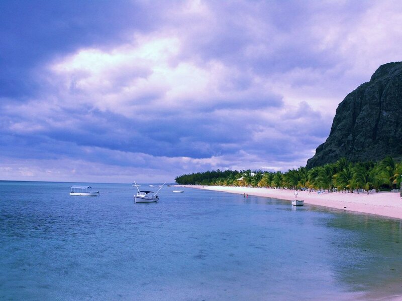 Beach with Boats and Mountain