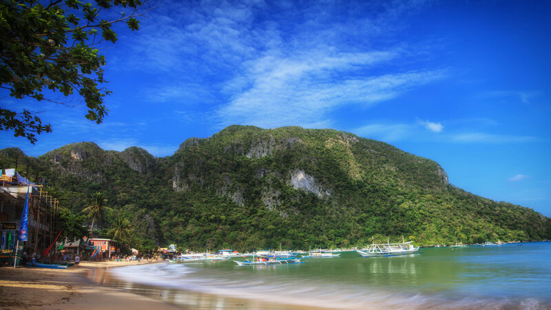 Beach with Boats and Mountains — Blue, Serene