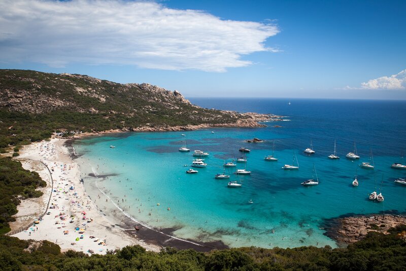 Beach with Boats and People — Blue, Serene, Afternoon, Photograph