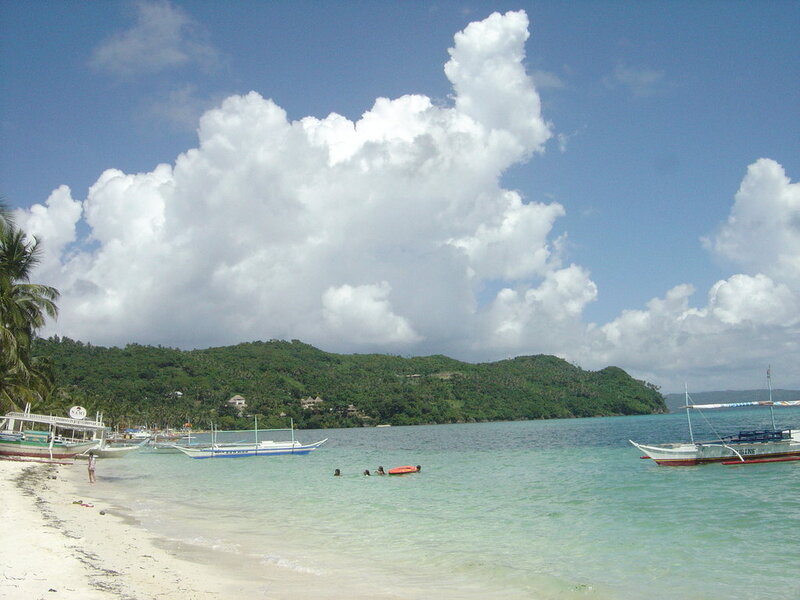 Beach with Boats and People — Blue, Serene