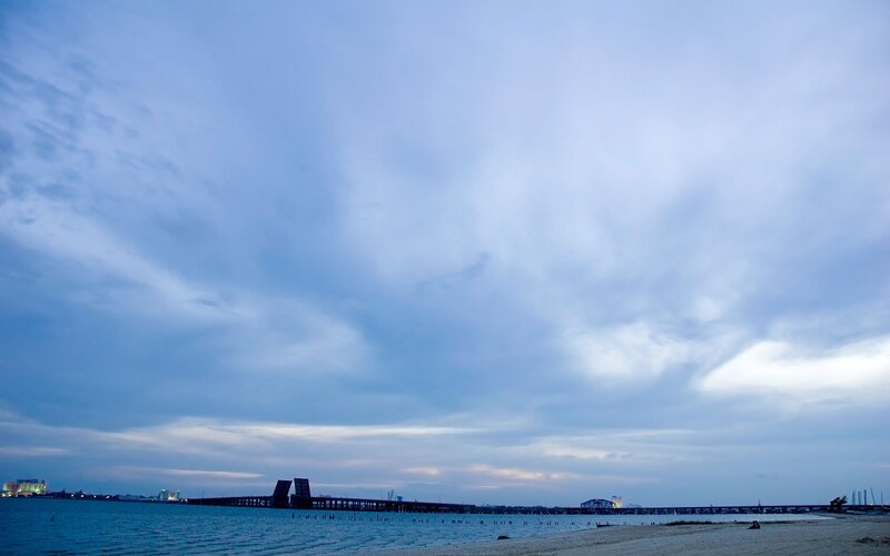 Beach with Bridge at Dusk