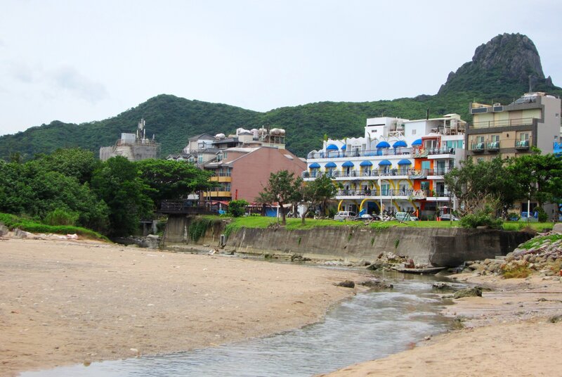 Beach with Buildings — Brown