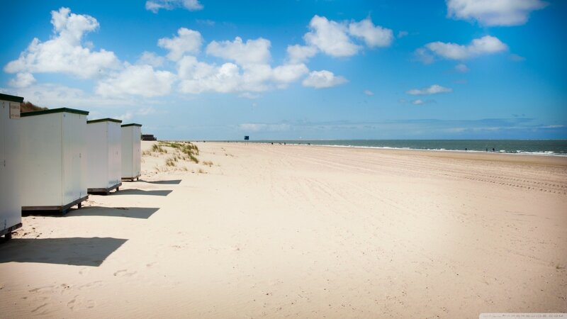 Beach with cabanas and ocean