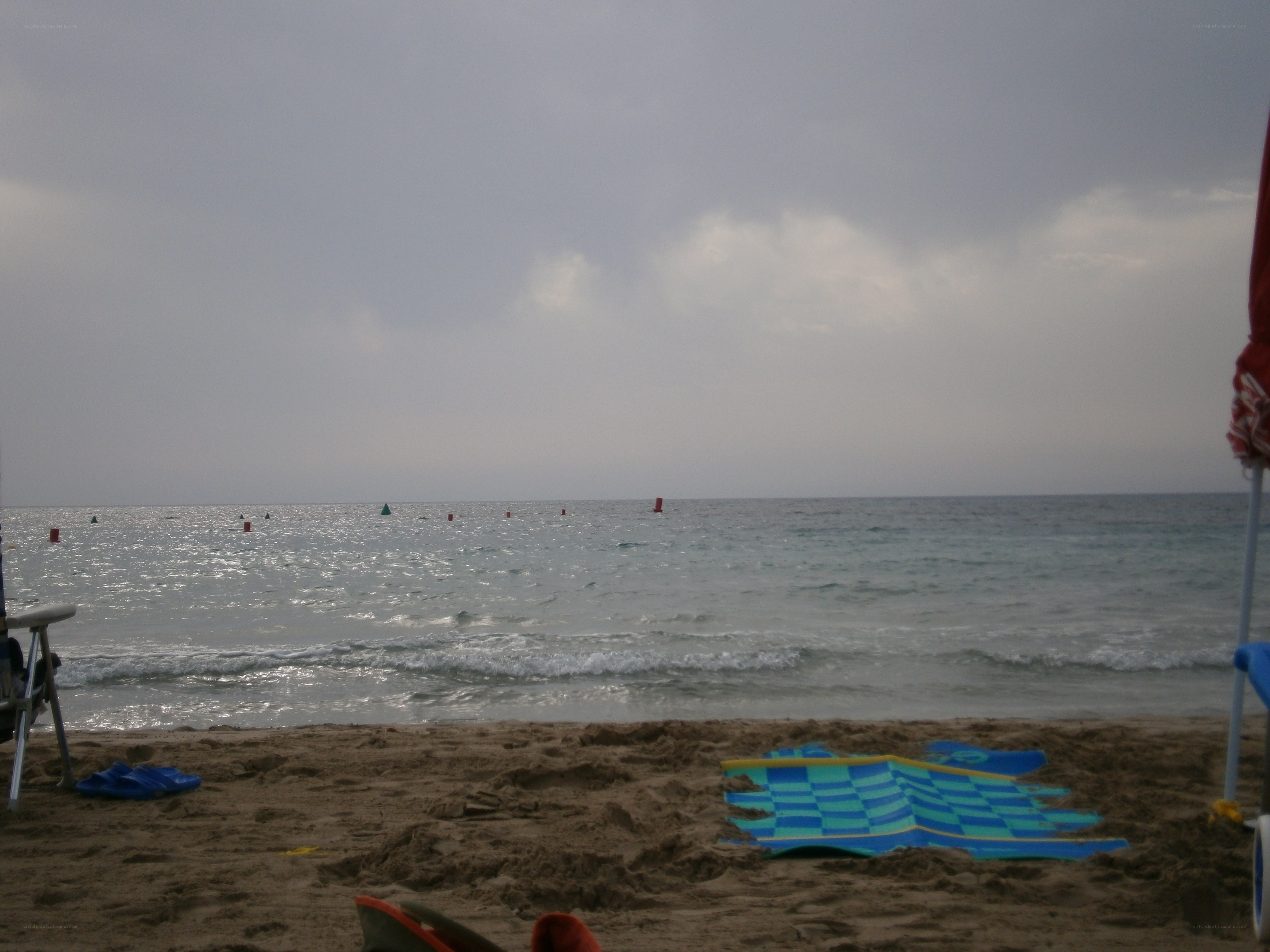 Beach with checkered mat