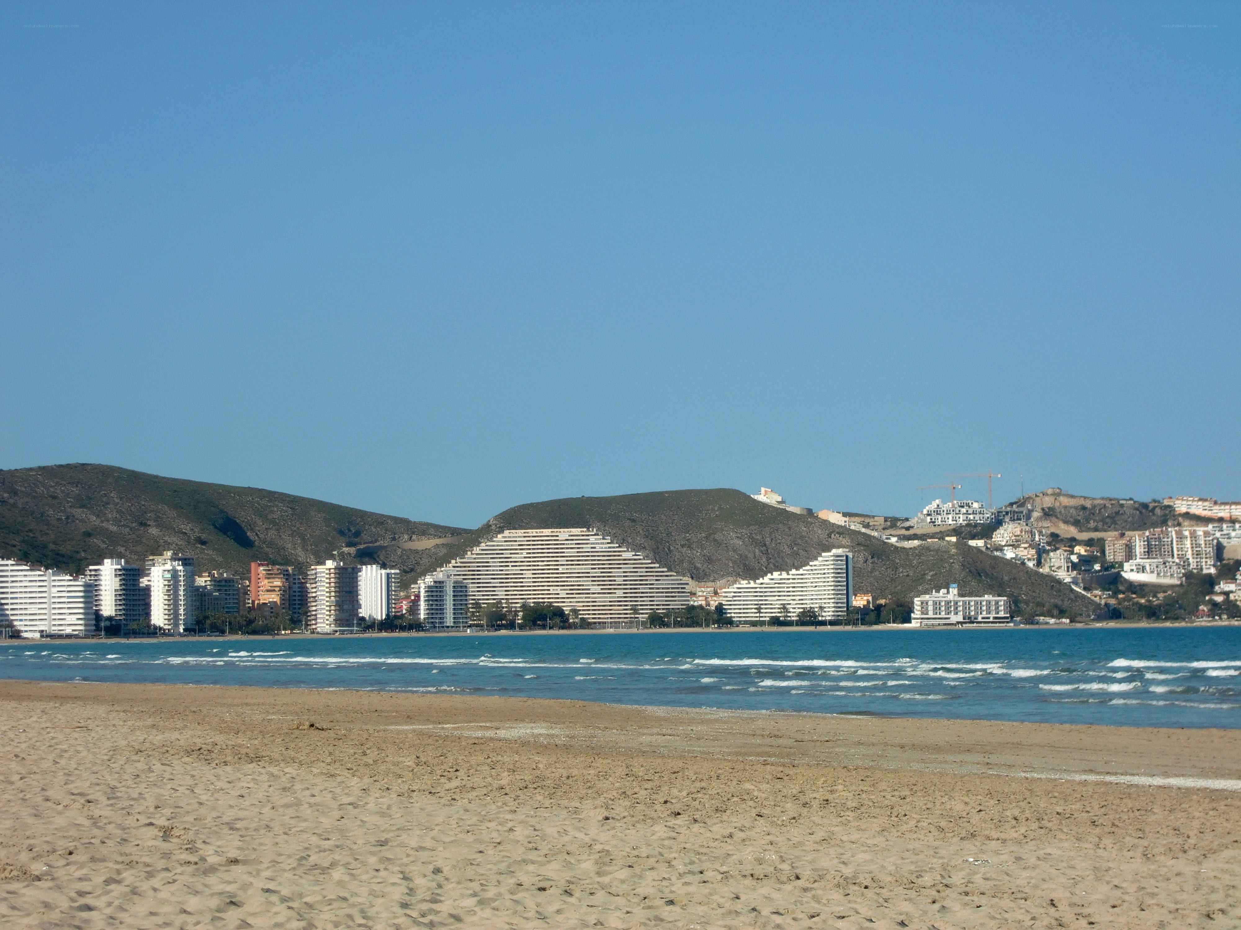 Beach with city skyline