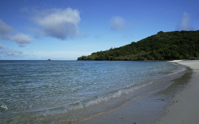 Beach with Clear Water — Blue, Serene, Afternoon, Photograph, Ocean
