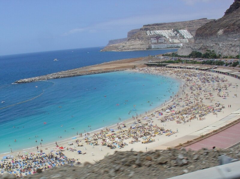 beach with cliffs and resort