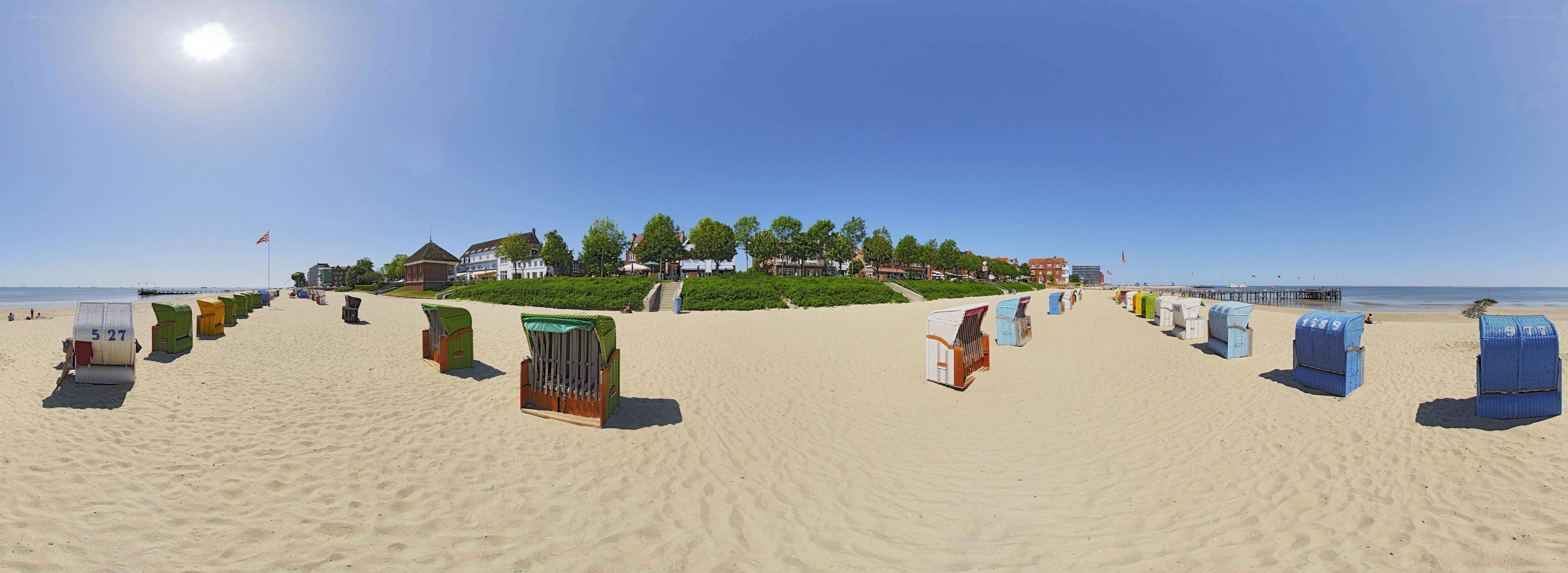 Beach with colorful chairs