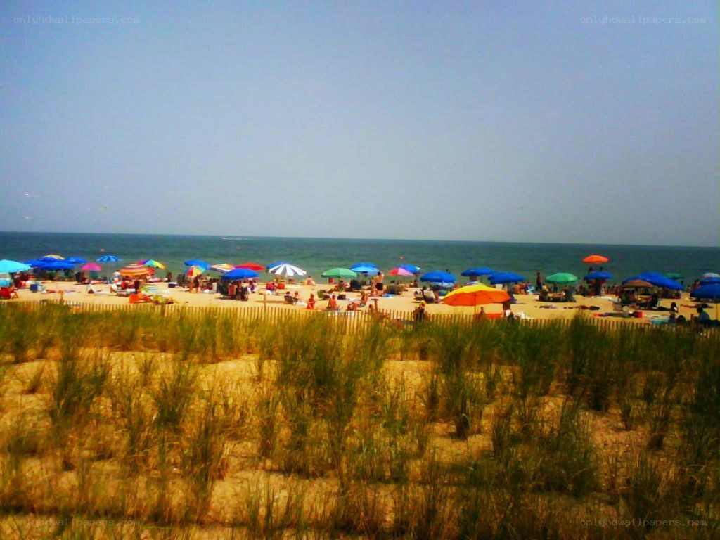 Beach with colorful umbrellas