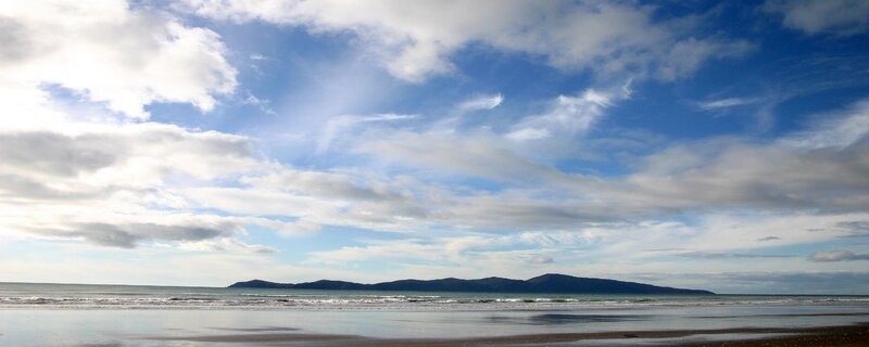beach with distant island