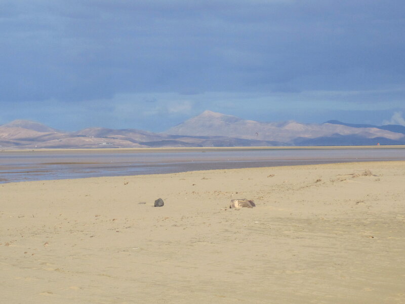 Beach with Distant Mountains — Blue