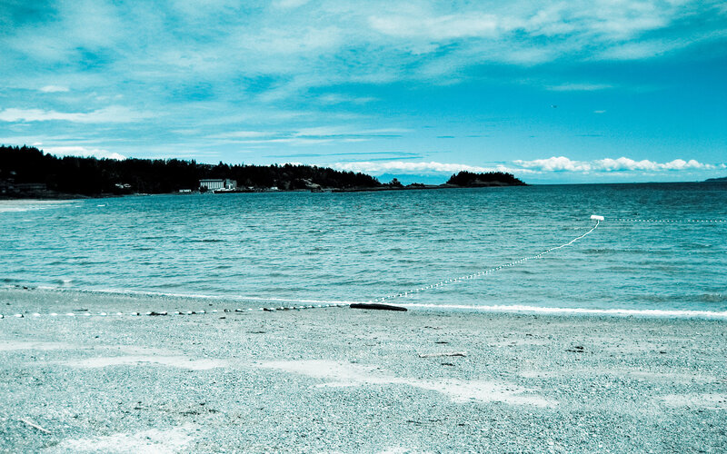 beach with floating barrier