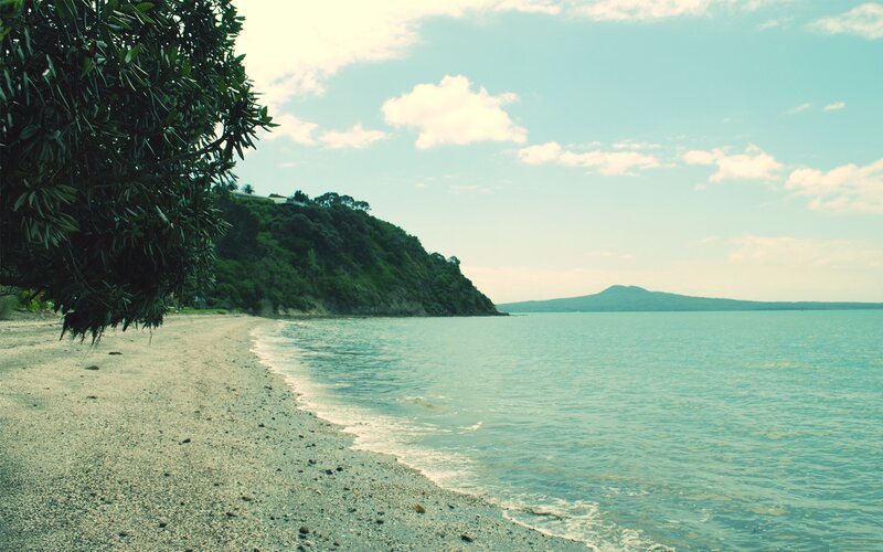 Beach with Green Hill — Serene