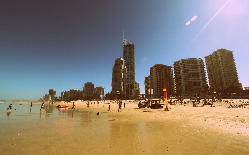 Beach with High-rise Buildings — Blue, Sunny, Afternoon, Photograph