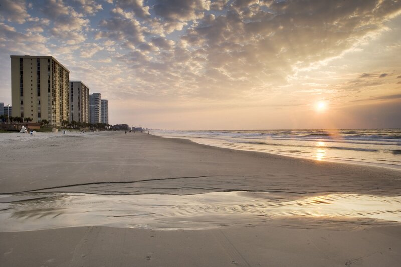 Beach with High-rise Buildings — Gold