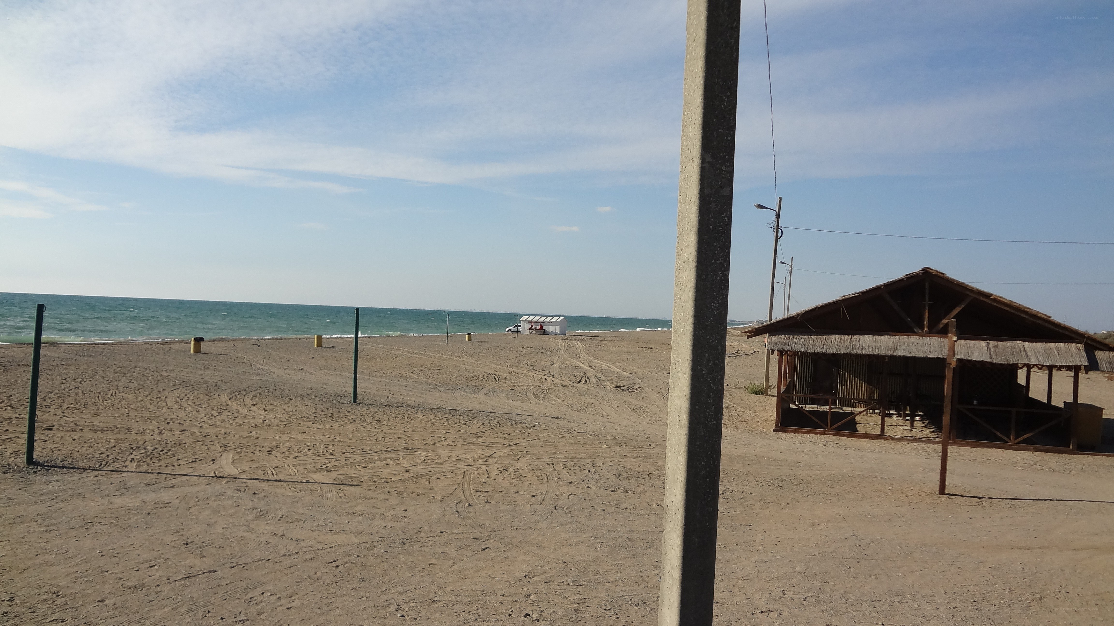 Beach with hut and ocean