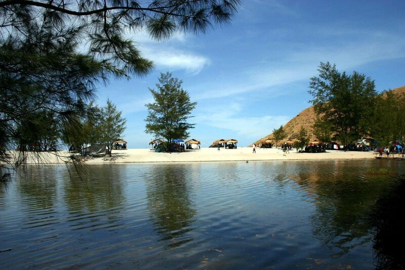 Beach with Huts and Trees