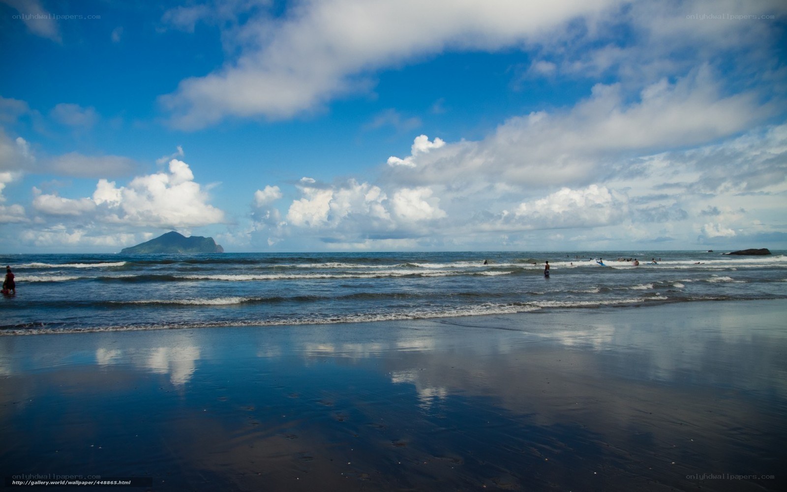 beach with island in distance
