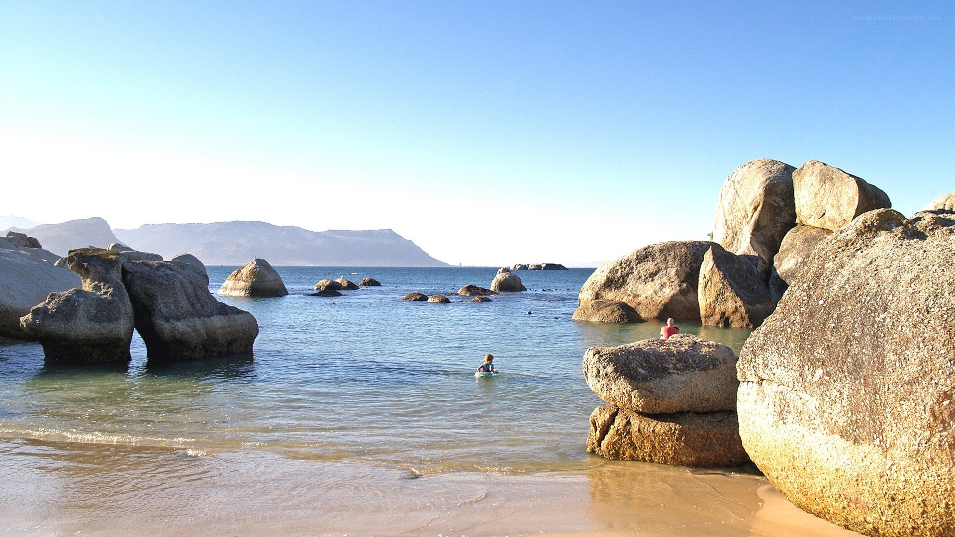 Beach with large boulders