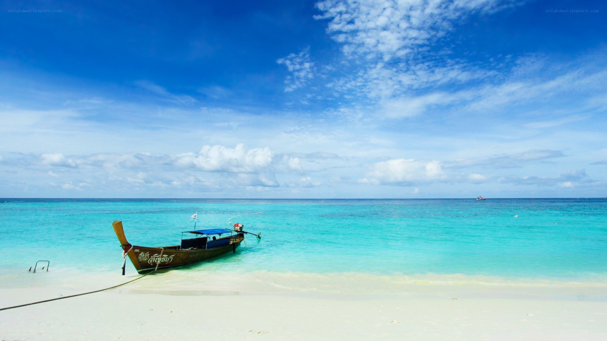 Beach with longtail boat