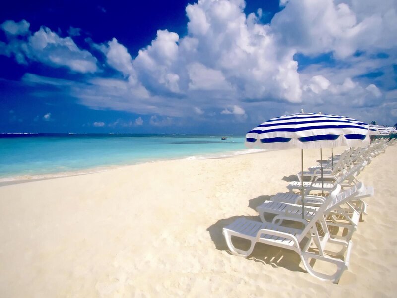 Beach with lounge chairs