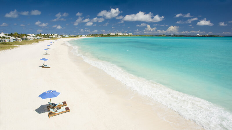 Beach with Lounge Chairs — Blue, Serene, Afternoon, Photograph, Umbrellas