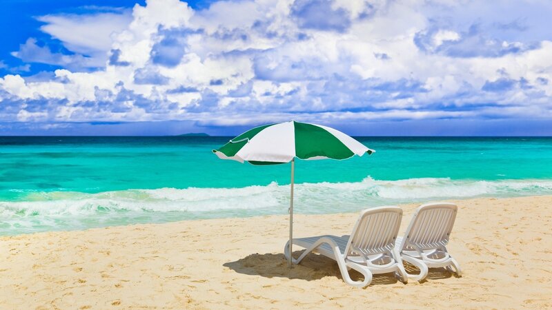 Beach with lounge chairs