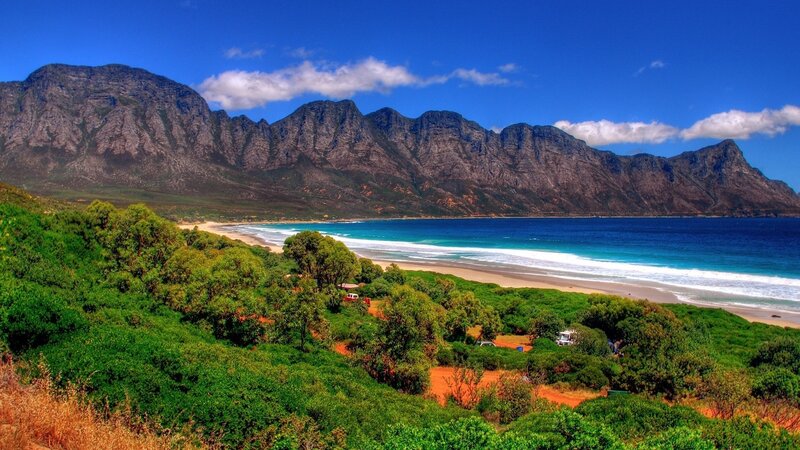 Beach with Mountains — Blue, Serene, Afternoon, Photograph, Ocean, Trees, Green