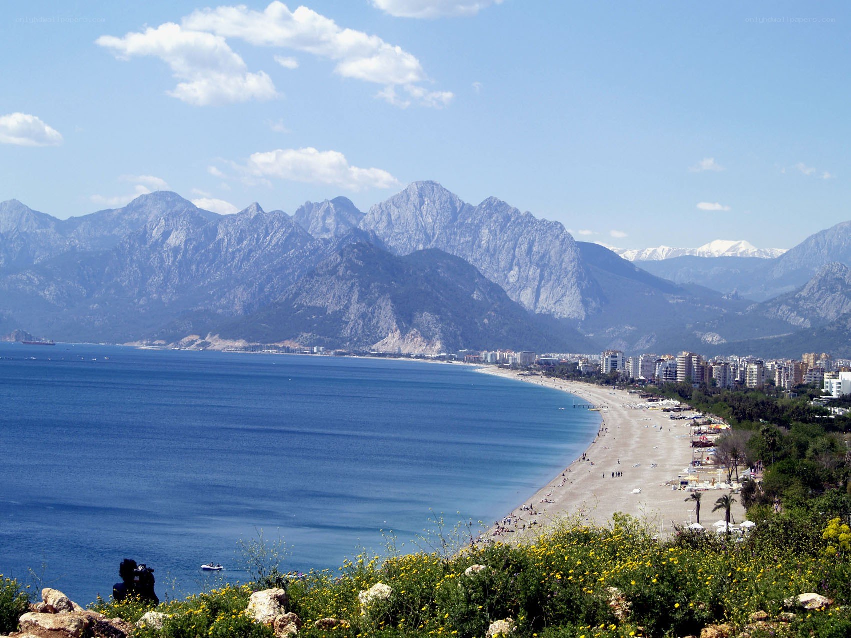 Beach with mountains in background