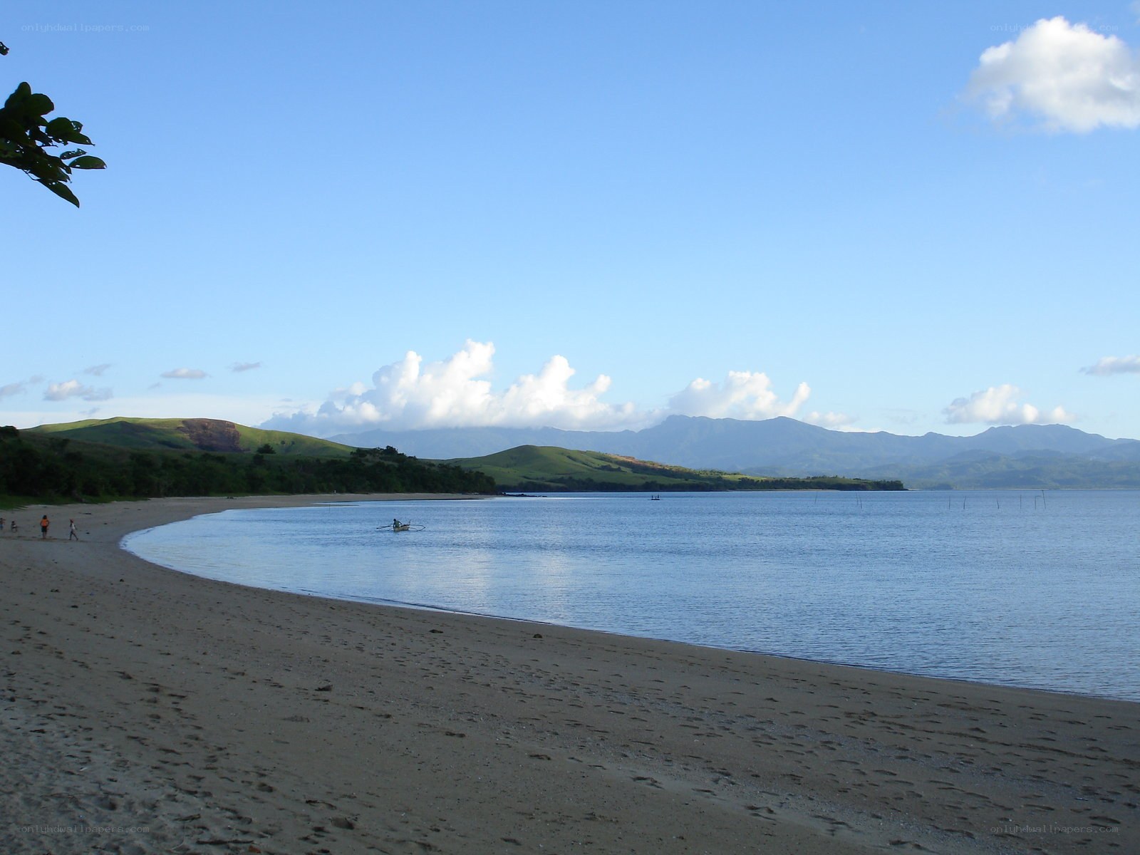Beach with mountains in background
