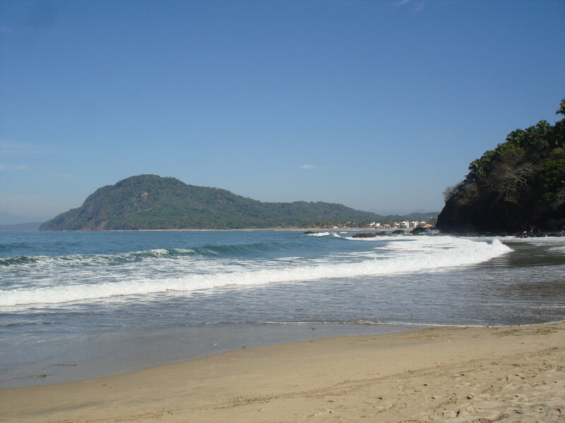 Beach with Ocean Waves — Blue, Serene, Afternoon, Photograph, Mountain, Trees