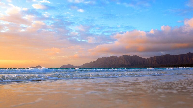 Beach with Ocean Waves — Blue, Serene, Sunset, Photograph, Mountains, Clouds