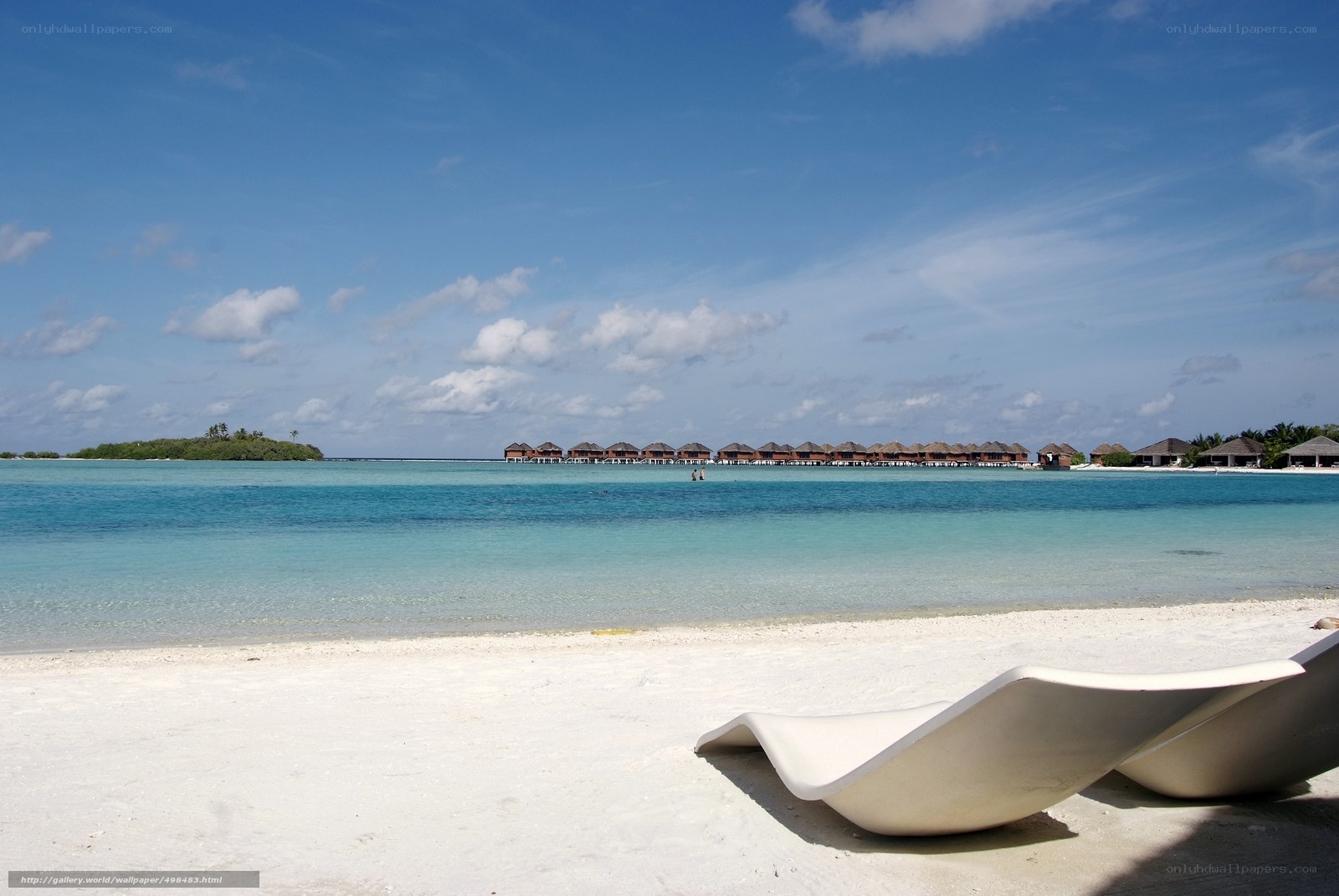 Beach with overwater bungalows