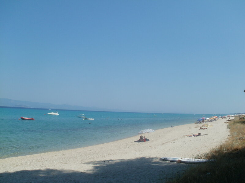 Beach with People and Boats