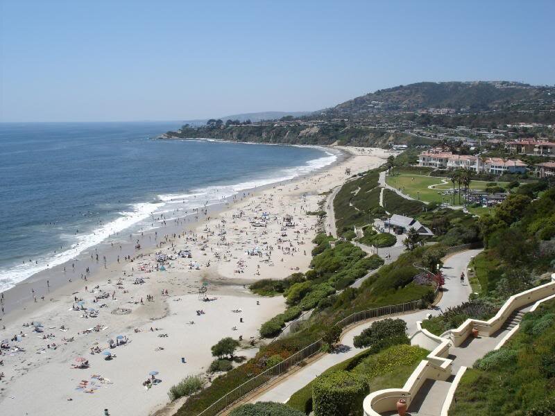 Beach with People and Cliffs
