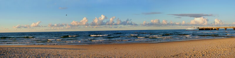 Beach with Pier and Boat
