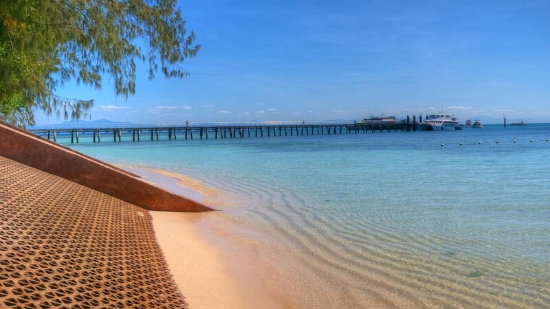 Beach with Pier and Boats