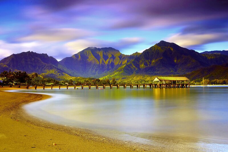 Beach with Pier and Mountains — Blue, Serene, Sunset