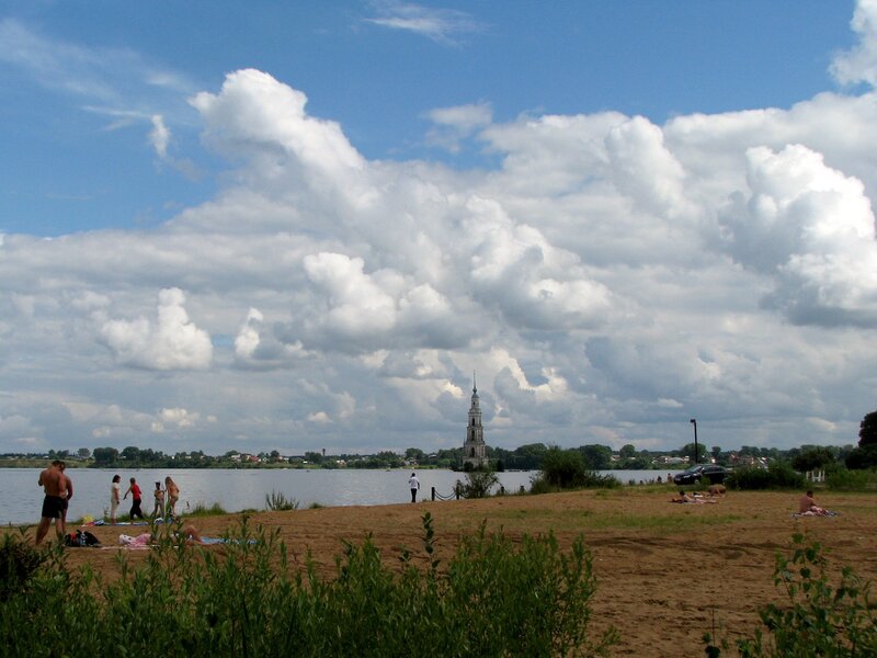 Beach with river and church tower
