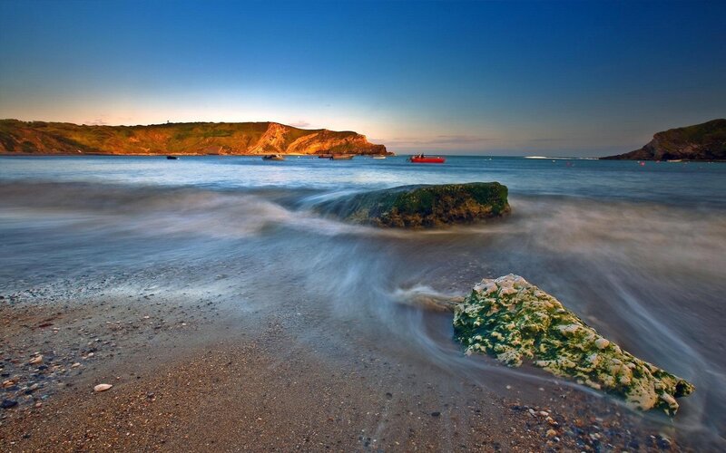 Beach with Rocks and Boats — Blue