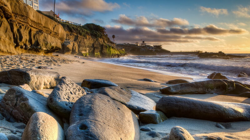 Beach with Rocks and Cliffs