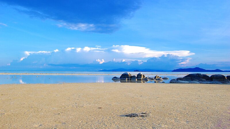 Beach with Rocks and Clouds — Blue, Serene, Afternoon