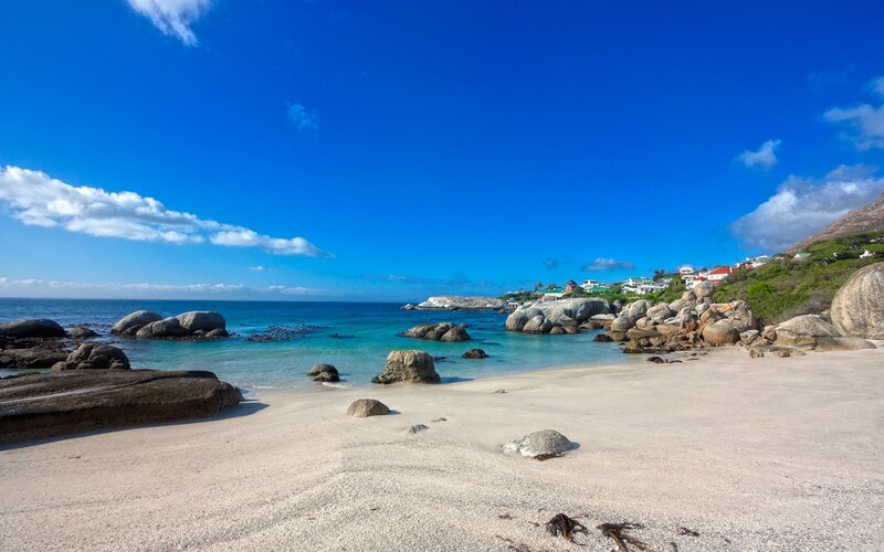 Beach with Rocks and Houses — Blue
