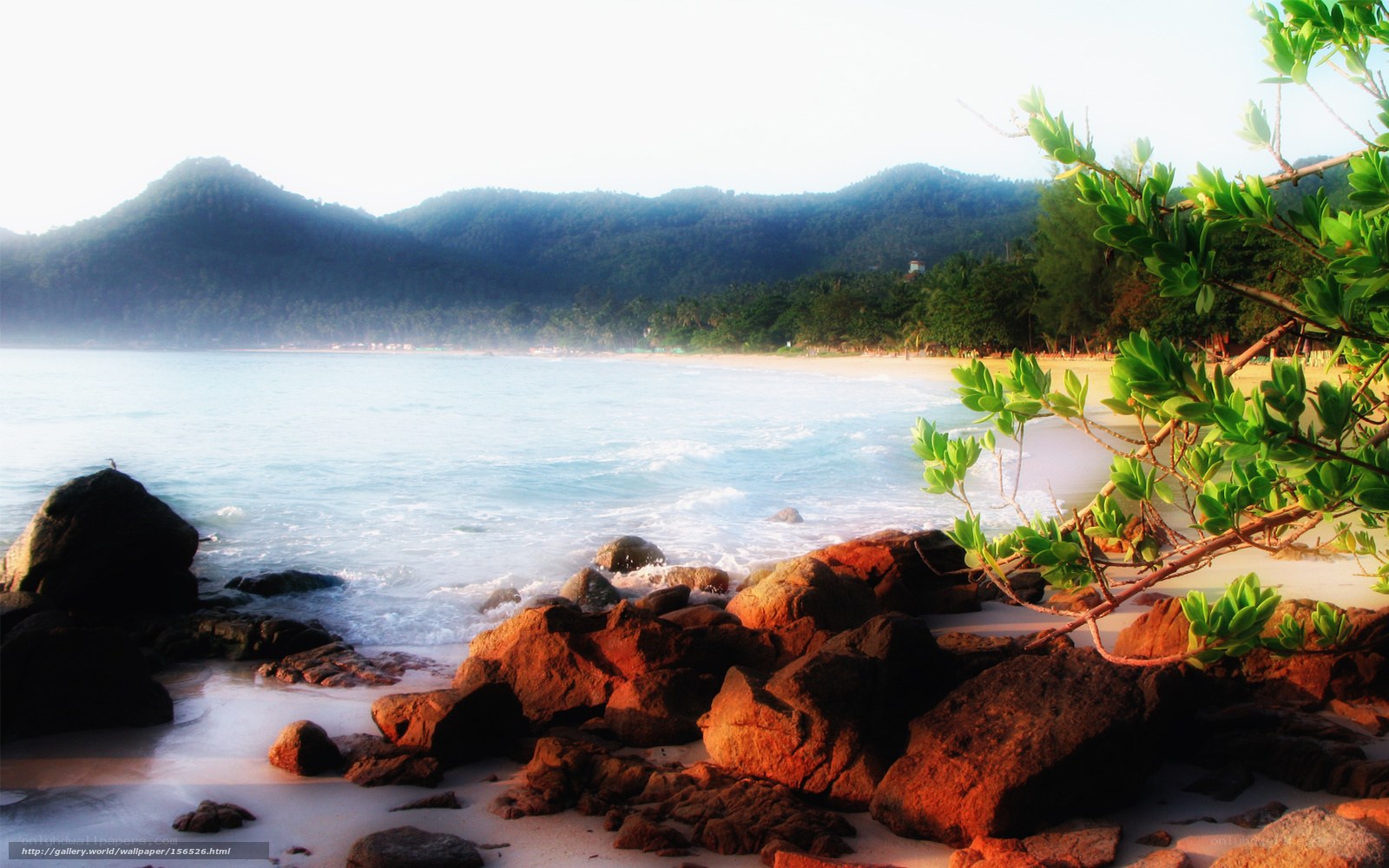 Beach with rocks and mountains